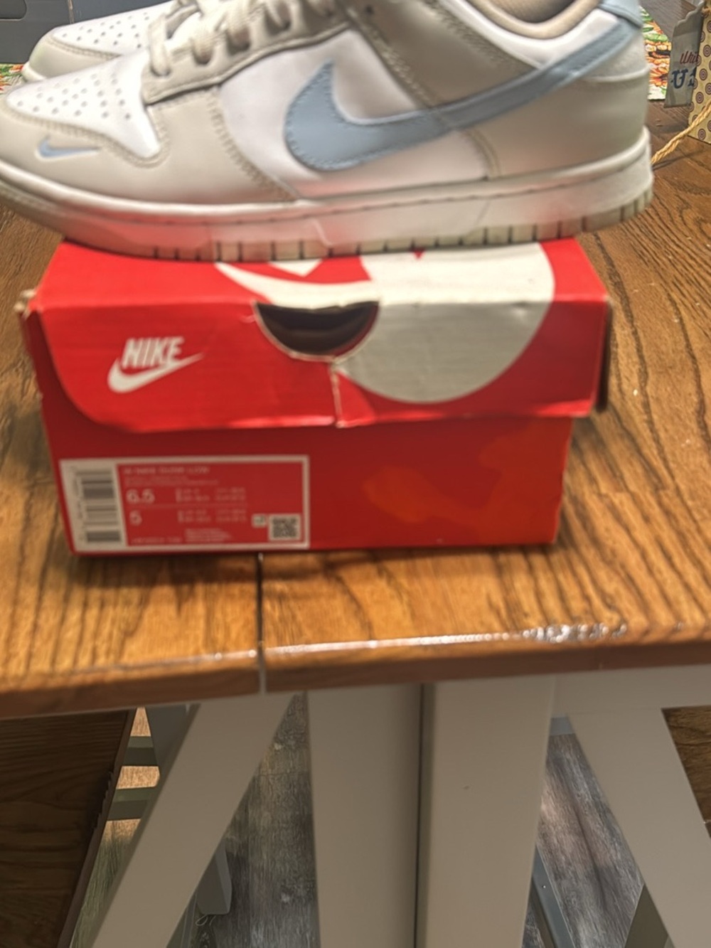 Nike White and Light Blue Low-Top Sneakers with Pale Blue Swoosh